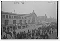 People waiting for the ocean liner RMS Mauretania (1906) at the Cunard Pier in New York City which was returning with American aviators and other troops from Europe after World War I on December 2, 1918