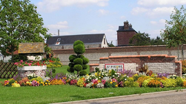 A floral display at the entrance to Saint-Pierre-lès-Elbeuf