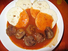 Meatballs with tomato sauce and bread dumplings in the Czech Republic