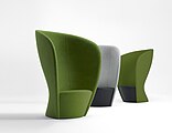 An upholstered lounge chair designed for privacy in public spaces, designed by Busk-Hertzog in 2011.