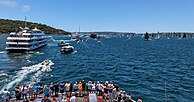 Spectators follow the 77th Sydney to Hobart Yacht Race
