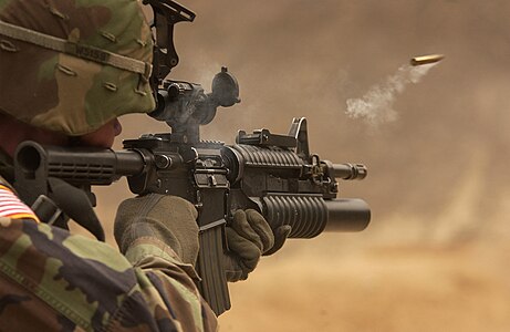 M4 Carbine Casing ejecting a Casing (ammunition), by Staff Sgt. Suzanne Day, United States Air Force