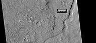 Channel with yardangs, as seen by HiRISE under HiWish program
