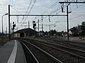 LouhansSortie de gare côté Dijon. Le panneau sens normal est au vert. Le panneau de sortie d'IPCS est fermé