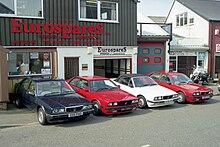 Eurospares storefront with 4 Maseratis parked outside.