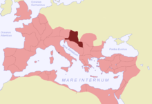 The Roman empire in red with a land in darker red; water is in pale blue, and non-Roman land in grey