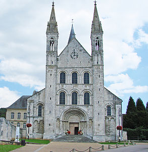 The Abbey of Saint-Georges, Boscherville, is very typical of Norman architecture of the early 12th century with storeys of identical windows, blind arcading and paired turrets. The facade reveals the form of nave and aisles.
