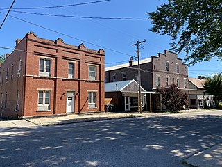 Rushville Hotel and Theater - Both built c.1910s The Rushville Theater (on right) features an auditorium on the second floor with a storefront on the ground floor. The Rushville Hotel (on left) now serves as an apartment building.