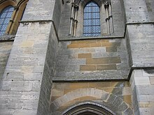 Photographie du détail des pierres sur la façade occidentale