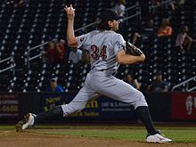 A baseball player in gray