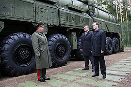 Dmitry Medvedev standing with MZKT-79221 Topol-M