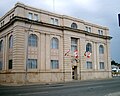 Government of Canada offices at the corner of May and Leith, an example of Beaux-Arts Classicism.[34] Constructed in 1913 of limestone, its architectural elements have been reduced to their bare essentials, representing a movement toward modern classicism.[35]