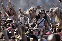 "Piggybacking" Women in the middle of a crowd