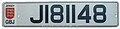 A Jersey registration front plate bearing the GBJ identifier