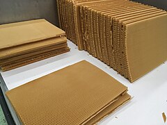 Honeycombs made by machine with beeswax and with the whole structure of the hexagonal cell already built
