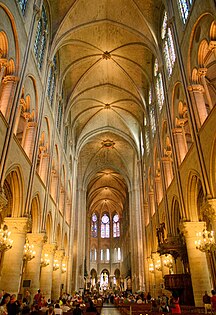 Interior of nave showing rib vaulting; in walls are clerestory windows (top), arches to triforium (middle), and arches to side aisles (bottom).