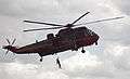 Un des Sea King est peint avec les couleurs nationales belges pour fêter les 25 ans de l'escadrille.