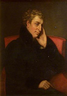 Painted portrait of a clean-shaven man with fair curly hair wearing a dark coat and sitting on a red chair.