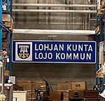 Lojo kommuns gränsskylt i Västra Nylands museums lager.