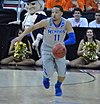 Michael Dixon is dribbling the ball for the Memphis Tigers at the NCAA Torunament in Raleigh