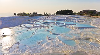 Aegean Region: Pamukkale in Denizli Province has snow-white color from travertine buildup.[336]