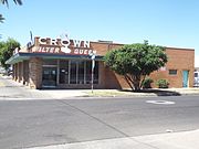 The Crown Filter Queen Building was built in 1955. It is located at 1800 W. Van Buren Avenue. The builders used clay brick and ashler sandstone. The building is listed in the National Register of Historic Places on July 10, 1992, reference #92000847, as part of the Oakland Historic District.