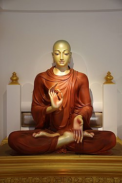 Statue of Śāriputra, depicting his "golden complexion".