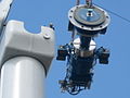 Image 43Typical components of a wind turbine (gearbox, rotor shaft and brake assembly) being lifted into position (from Wind power)