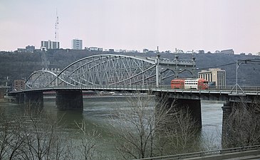 View from downtown in 1984, with a streetcar leaving the bridge