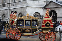 Queen Elizabeth II approaches Horse Guards following the State Opening of Parliament in 2008.