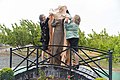 Sculptor Nune Tumanyan and philanthropist Judy Saryan unveil the statue