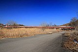 全景。右岸上流側より望む。手前の道路は河川管理用通路。