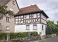 Wohnhaus-Anbau mit abgewalmtem Dach