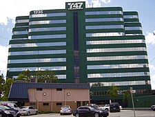 A multi-story office building topped with a Telemundo 47 logo