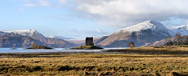 View of Loch Laich and Castle Stalker with Morvern mountains in background