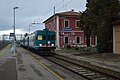 A diesel railcar on a Siena-Grosseto regionale service calls at the junction of Montepescali.