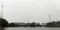 The Baltimore and Ohio Railroad Bridge, built in the late 19th or early 20th century as a two track, swing bridge across the Schuylkill River in the Grays Ferry neighborhood in Philadelphia, Pennsylvania. Now a CSX Philadelphia Subdivision bridge. View of the bridge looking downstream.