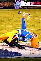The Southern University drum major performs a backbend.