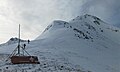 Skiers climbing the north ridge of Storm Peak