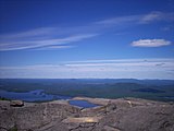 Northwest view from Ampersand of Middle Saranac Lake (left), with Weller Pond directly above. Upper Saranac Lake is just visible at top, and Lower Saranac Lake at far right.