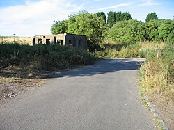 Derelict former guardroom at the site of RAF Abbots Bromley in 2006.