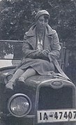 Lisa Matthias on her car in 1927