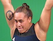 Tattoo on upper arm of weightlifter Luisa Peters