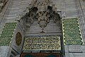 Muqarnas and calligraphy over the mosque's entrance portal