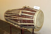 The pakhavaj, a traditional barrel-shaped, two-headed drum