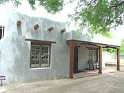 The Pueblo Revival Residence located at 46 E. Greenway Road was built in 1926. It was listed in the Phoenix Historic Property Register in July 1993.