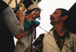 Preparing a rod puppet for a performance of Town Musicians of Bremen, Sibiu, Romania, 2002.
