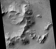 Central mound of Burton Crater, showing dark slope streaks, as seen by CTX camera (on Mars Reconnaissance Orbiter). Note: this is an enlargement of the previous image of Burton Crater.