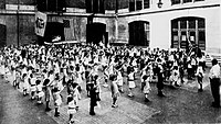 School children saluting the American flag, September 1915