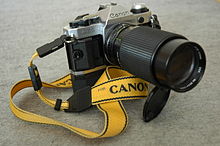 Canon AE-1 Program with telephoto lens and power winder